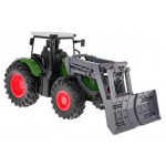 Zelený traktor s buldozérom